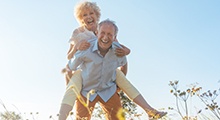 older couple smiling and being care free