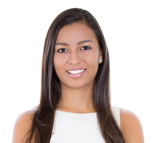 Woman with long dark hair smiling