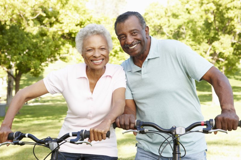 Couple smiling outside